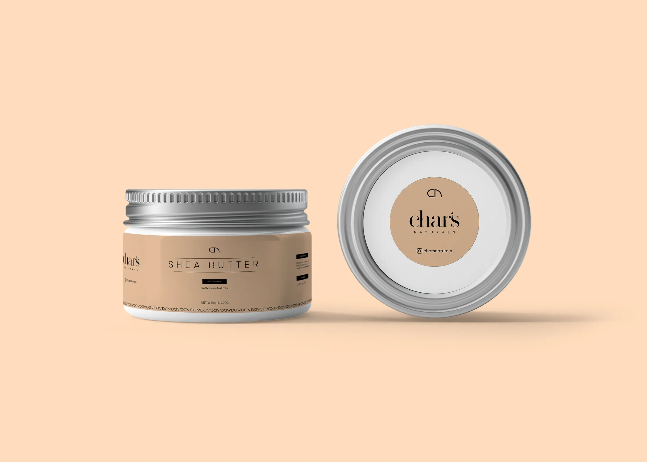 Char's Naturals shea butter packaging — a cream-labelled 300g tub and lid on a peach background.
