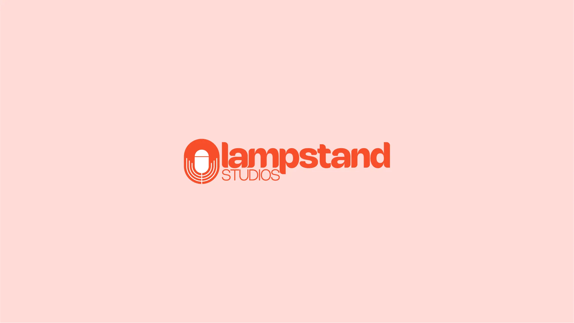 The full lampstand STUDIOS logo in orange on a soft pink background.